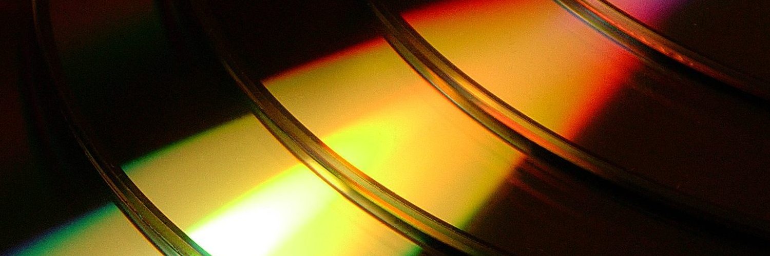 light reflecting on old cd's